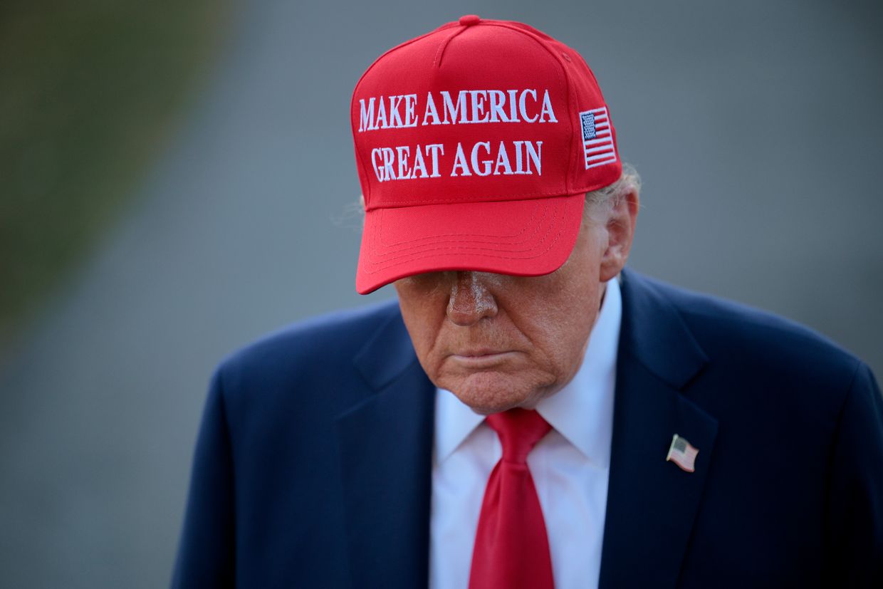 U.S. President Donald Trump speaks to reporters as he departs the White House in Washington, DC, U.S. on Feb. 28, 2025.